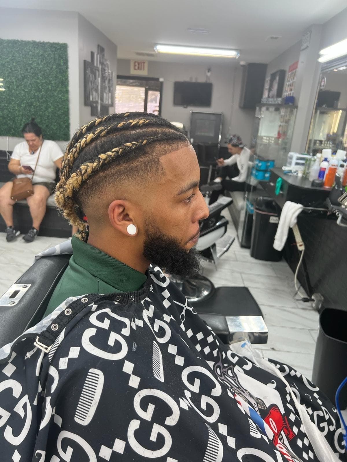 Straight-back braids and beard shape-up by The Fade Crew